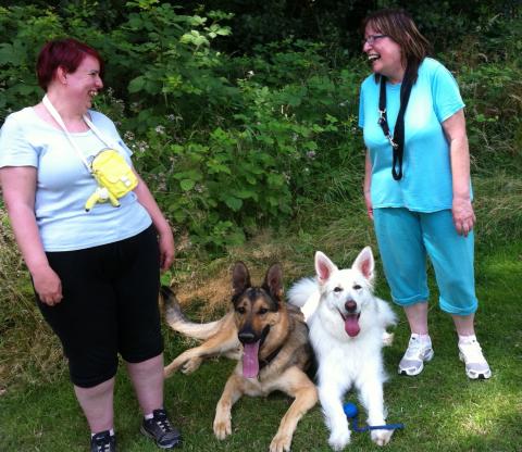 Storm the white German Shepherd with Boy